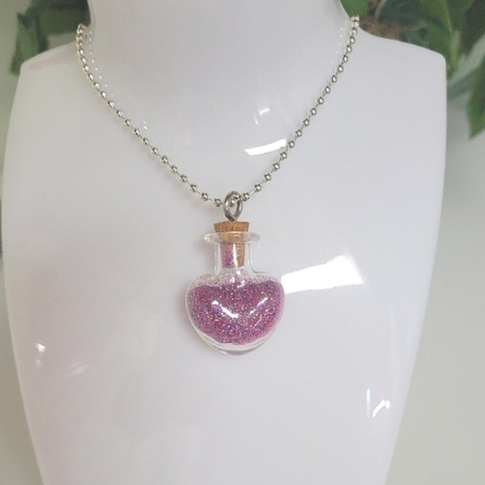 PRETTY HANDMADE HEART NECKLACE WITH PINK HOLOGRAPHIC FINE GLITTER.